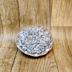Assortment of shells in basket or pearl shell