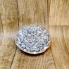 Assortment of shells in basket or pearl shell